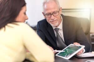 A data breach expert giving a client tips on preventing data breaches.